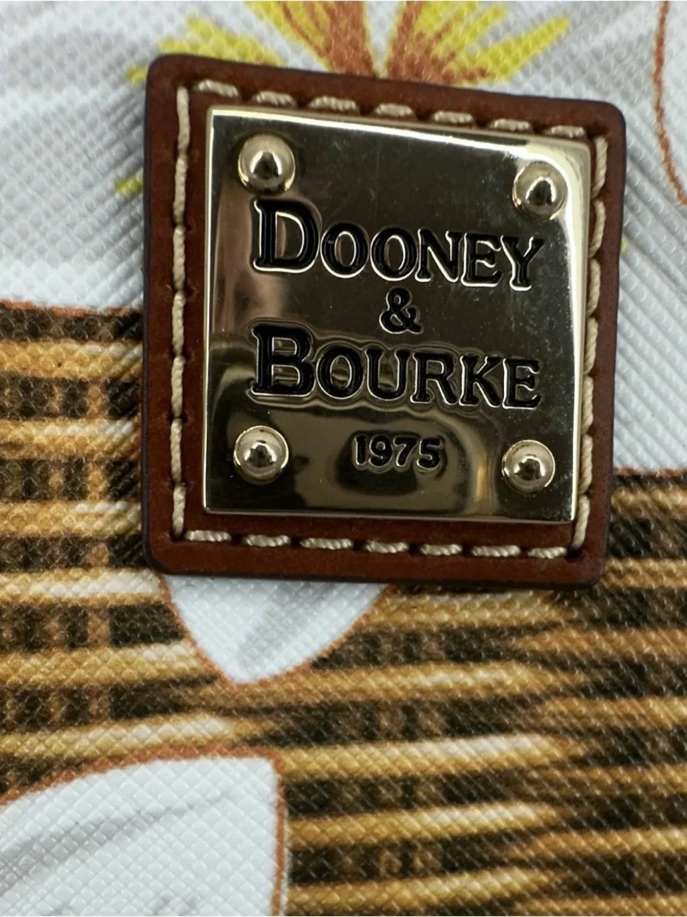 Dooney & Bourke Brown Wicker Floral Wristlet with Yellow Accents
